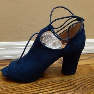 Navy open toe pumps